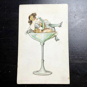 Vintage Postcard Creme de Mentha Lady Sitting in Champaign Glass Non Topographic